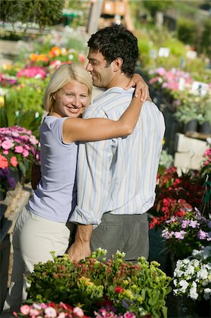 simsearch:694-03692195,k - Couple at Plant Nursery hugging Stock Photo - Premium Royalty-Free, Code: 694-03692201