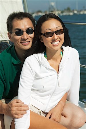 sailboat couple - Couple on sailboat, (portrait) Stock Photo - Premium Royalty-Free, Code: 694-03692318