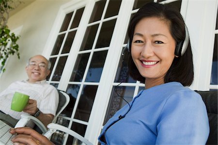 Senior couple relaxing on porch Stock Photo - Premium Royalty-Free, Code: 694-03692735