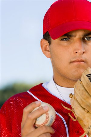 pelota de béisbol - Baseball pitcher holding glove and ball, (close-up) Foto de stock - Sin royalties Premium, Código: 694-03692841