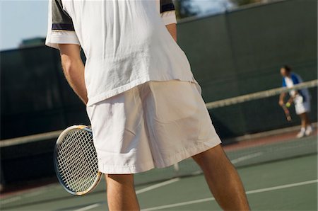 Tennis Player on court, Waiting For Serve, back view Stock Photo - Premium Royalty-Free, Code: 694-03693179