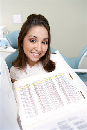 dental work - Young woman at dentists, smiling, (portrait) Stock Photo - Premium Royalty-Free, Code: 694-03693330