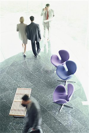 simsearch:695-03381633,k - Business executives in lobby, high angle view Stock Photo - Premium Royalty-Free, Code: 695-05764538