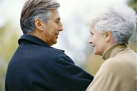 Senior couple, looking at each other Stock Photo - Premium Royalty-Free, Code: 695-05764703