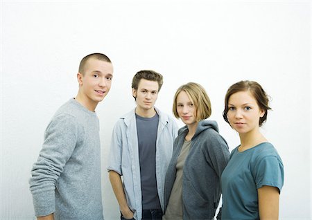 friends silhouette group - Four young friends, looking at camera, portrait Foto de stock - Sin royalties Premium, Código: 695-05765107