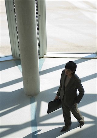 Businesswoman in silhouette, high angle view Stock Photo - Premium Royalty-Free, Code: 695-05765225