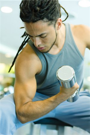 simsearch:695-03375202,k - Man working biceps with dumbbell Stock Photo - Premium Royalty-Free, Code: 695-05765361