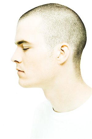 Young man's head, eyes closed, profile Stock Photo - Premium Royalty-Free, Code: 695-05765686