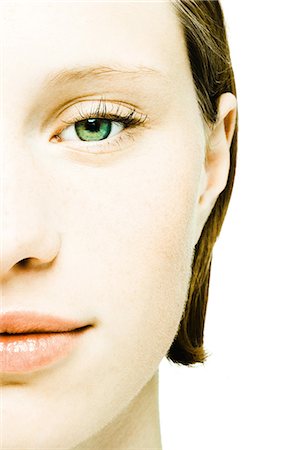 simsearch:695-03375605,k - Teenage girl's face, extreme close-up Foto de stock - Royalty Free Premium, Número: 695-05765689