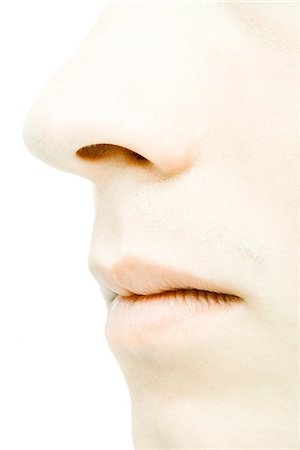 simsearch:695-05770428,k - Young man's face, extreme close-up Stock Photo - Premium Royalty-Free, Code: 695-05765710