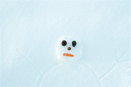 draw close up face - Snowman drawing on the ground, portrait, view from directly above Stock Photo - Premium Royalty-Free, Code: 695-05766590