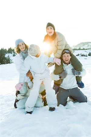 simsearch:695-05766416,k - Young friends playing around in snow, group photo Stock Photo - Premium Royalty-Free, Code: 695-05766593