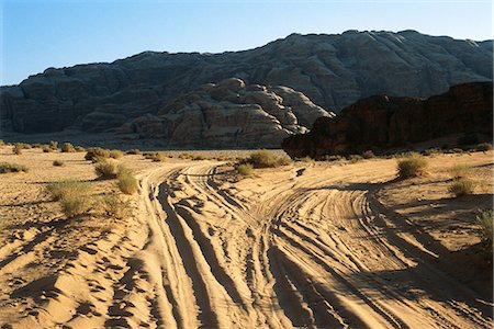 Jordan, dirt path toward rock formation Stock Photo - Premium Royalty-Free, Code: 695-05767145