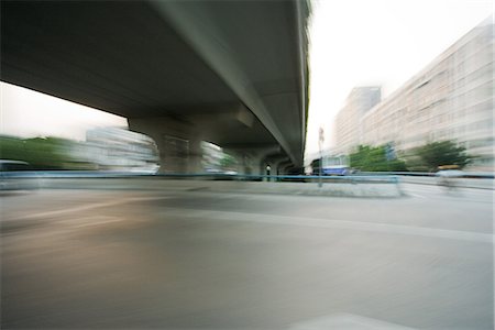Overpass viewed from freeway, blurred motion Stock Photo - Premium Royalty-Free, Code: 695-05767341