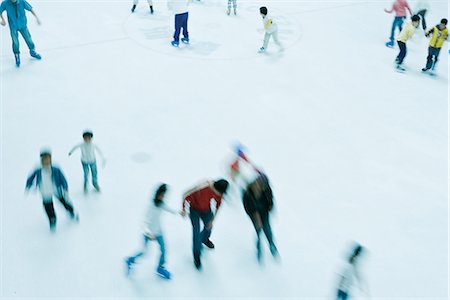 skating ice background - Ice skaters, high angle view Stock Photo - Premium Royalty-Free, Code: 695-05767383