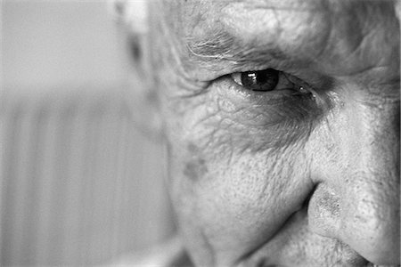 eye senior - Senior man looking at camera, close-up, cropped Stock Photo - Premium Royalty-Free, Code: 695-05767971