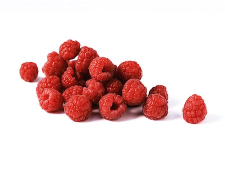 rasberries on white background - Fresh raspberries, close-up Stock Photo - Premium Royalty-Free, Code: 695-05768317