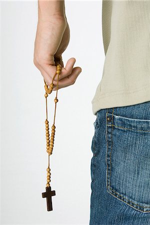 simsearch:695-05776390,k - Male holding rosary, cropped rear view Foto de stock - Sin royalties Premium, Código: 695-05768396