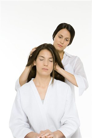 Woman receiving head massage, eyes closed Stock Photo - Premium Royalty-Free, Code: 695-05768445