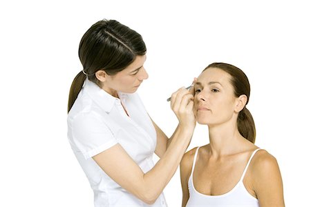 desagradable - Woman having eyebrows tweezed, frowning Foto de stock - Sin royalties Premium, Código: 695-05768447