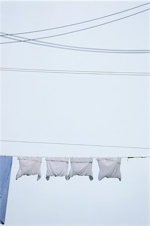 Laundry hanging on clothes-line Stock Photo - Premium Royalty-Free, Code: 695-05769526