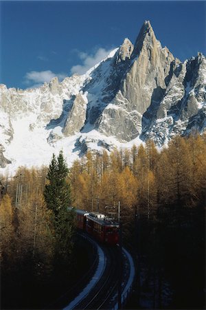 Train moving through the alps Stock Photo - Premium Royalty-Free, Code: 695-05769583