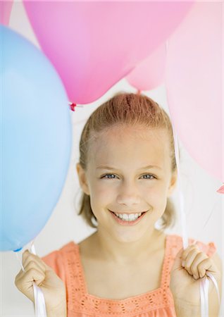 simsearch:695-05763215,k - Girl holding balloons Stock Photo - Premium Royalty-Free, Code: 695-05763215