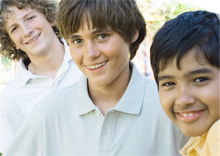 simsearch:695-05763392,k - Three preteen boys, smiling Stock Photo - Premium Royalty-Free, Code: 695-05763353