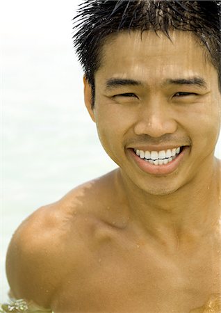 simsearch:632-01146602,k - Man in water, smiling, portrait Stock Photo - Premium Royalty-Free, Code: 695-05763654