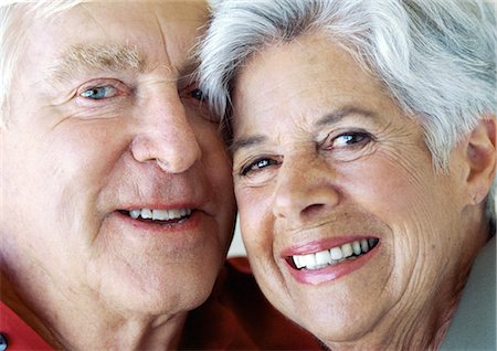 senior couple eye contact head and shoulders not indoors - Senior couple cheek to cheek, smiling, portrait Stock Photo - Premium Royalty-Free, Code: 695-05774003