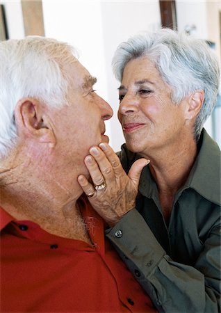 senior couple with pet - Senior couple, woman caressing man's face Stock Photo - Premium Royalty-Free, Code: 695-05774023