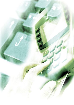 Hand on credit card machine, and computer keyboard, superimposed pictures, close-up Stock Photo - Premium Royalty-Free, Code: 695-05774129