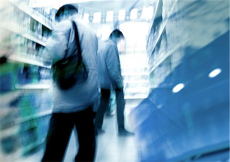 shoppers blurry marketplace - People looking at shelves in supermarket, blurred Stock Photo - Premium Royalty-Free, Code: 695-05774139