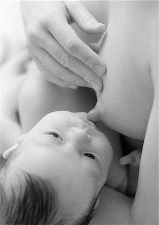 Infant breastfeeding, b&w Foto de stock - Sin royalties Premium, Código: 695-05774629