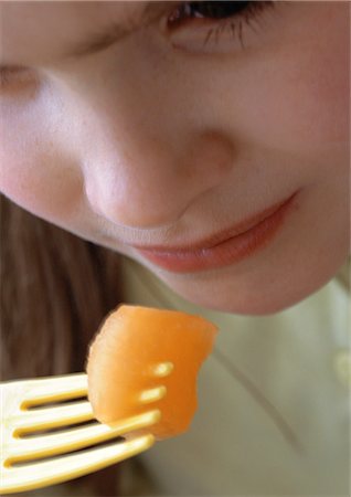 eat mouth closeup - Child eating, close-up. Stock Photo - Premium Royalty-Free, Code: 695-05774782