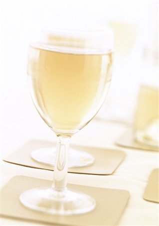 drink coaster - Glass of white wine Stock Photo - Premium Royalty-Free, Code: 695-05774849