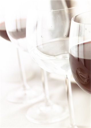 simsearch:652-03804516,k - Glasses of red wine and water, close-up Stock Photo - Premium Royalty-Free, Code: 695-05774881