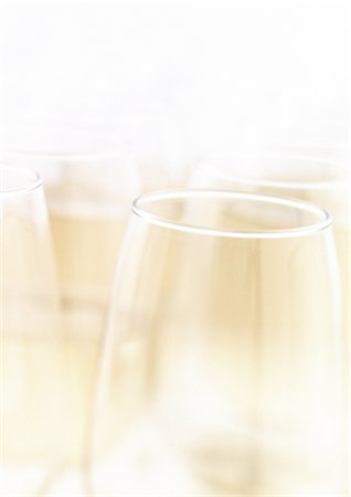 simsearch:695-05774901,k - Champagne flutes, extreme close-up Fotografie stock - Premium Royalty-Free, Codice: 695-05774909