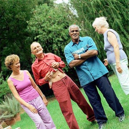 elderly people with ethnic diversity - Four mature people standing outdoors Stock Photo - Premium Royalty-Free, Code: 695-05775157