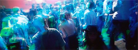 saturated color - Crowd of people dancing at a nighclub Stock Photo - Premium Royalty-Free, Code: 695-05775206