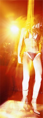 exotic dancer - Dancer on platform in nightclub Stock Photo - Premium Royalty-Free, Code: 695-05775203