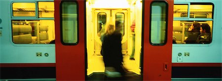 People getting off of subway train Fotografie stock - Premium Royalty-Free, Codice: 695-05775216