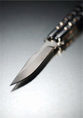 Pocket knife, close-up Foto de stock - Sin royalties Premium, Código: 695-05775395