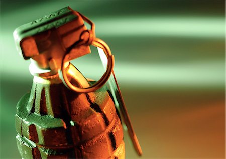 exploding (ignited explosion) - Hand grenade, close-up Stock Photo - Premium Royalty-Free, Code: 695-05775423