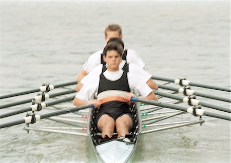 scull - Four teenage boys rowing crew in boat Foto de stock - Sin royalties Premium, Código: 695-05775856