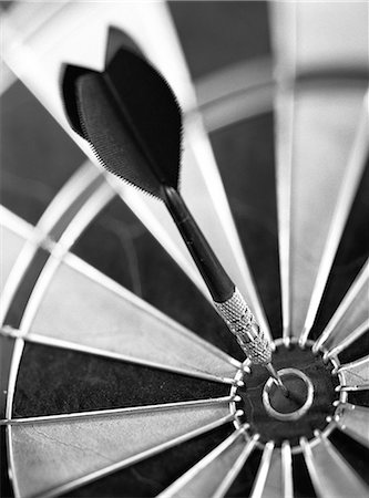 darts nobody - Dart in center of dartboard, close-up Stock Photo - Premium Royalty-Free, Code: 695-05776335