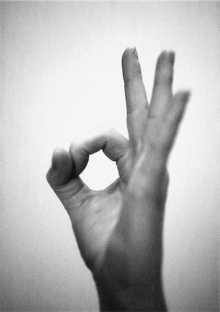 Hand forming ok sign, close-up, b&w Stock Photo - Premium Royalty-Free, Code: 695-05776384