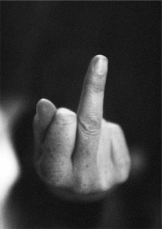 Hand making obscene gesture, close-up, b&w Foto de stock - Royalty Free Premium, Número: 695-05776411