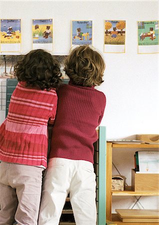 pictures of kids and friends playing at school - Two children side by side, rear view Stock Photo - Premium Royalty-Free, Code: 695-05776447