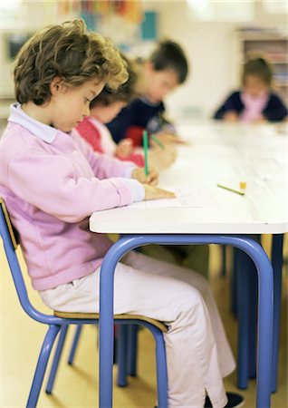 simsearch:695-05776481,k - Children in classroom, side view Stock Photo - Premium Royalty-Free, Code: 695-05776480